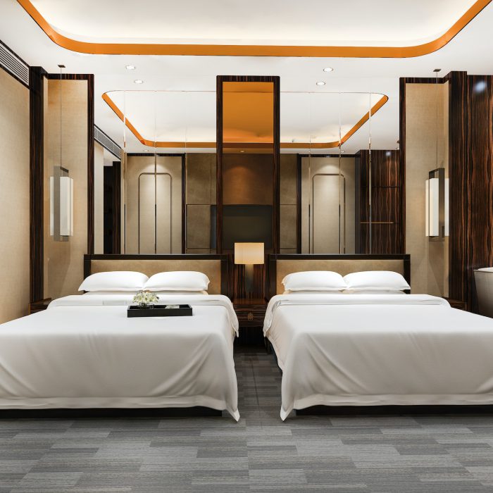 3d-rendering-luxury-bedroom-suite-in-resort-hotel-with-twin-bed-and-living.jpg